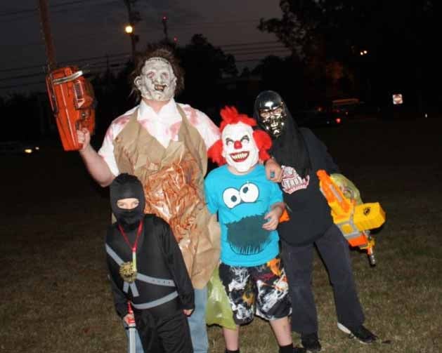Troy Police Sgt. Jimmy Mueller traded in his good guy status to play Leatherface from the Texas Chainsaw Massacre. His children, Alex and Riley also donned scary masks for Halloween. Ninja Parker Cox is the son of Troy Fire Department Lt. Brandy Cox.