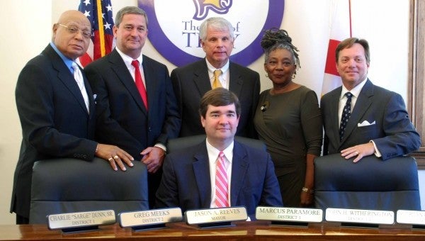 Troy officials were sworn in at a ceremony at City Hall Monday morning. From left are council members Charlie “Sarge” Dunn, Greg Meeks, Johnny Witherington, Dejerilyn Henderson, Marcus Paramore and Mayor Jason Reeves.