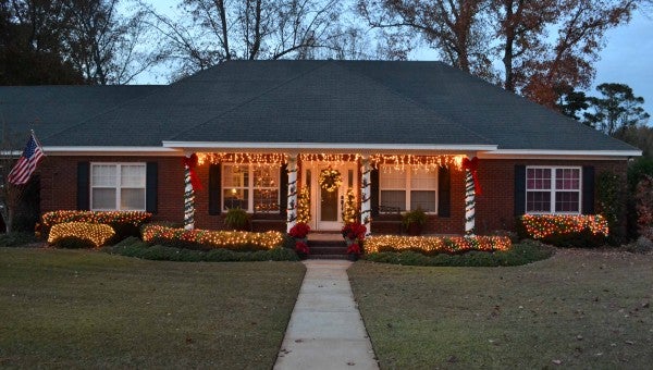The Lowerys have already decked their halls, and poarch and shrubs for the Christmas season. The family put up the lights on their Shiloh Road home Monday afternoon. They are only one of several families who have homes aglow with holiday lights in Troy.