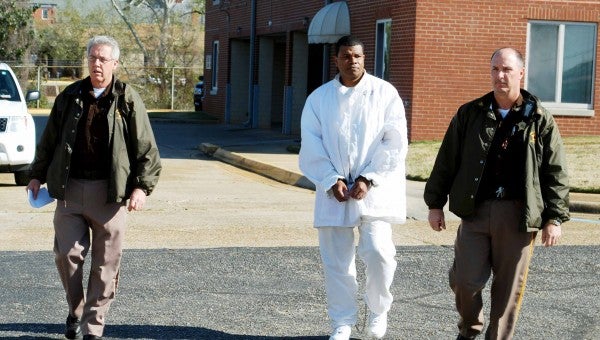 Photo | Robbyn Brooks Andre Ellis is escorted back to the Pike County Jail after receiving sentences for two rapes and burglary that happened a year ago, Tuesday.