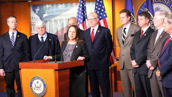 Rep. Martha Roby speaks out against continued cuts to the military budget at a Capitol Hill news conference on Friday. Pictured behind Rep. Roby from Left to Right are Rep. Mac Thornberry (R-TX), Rep. Rob Bishop (R-UT), Rep. Randy Forbes (R-VA), Rep. Howard P. 'Buck' McKeon (R-CA), Rep. Michael Turner (R-OH), Rep. Rob Whittman (R-VA), Rep. Mo Brooks (R-AL) and Rep. Joe Wilson (R-SC).