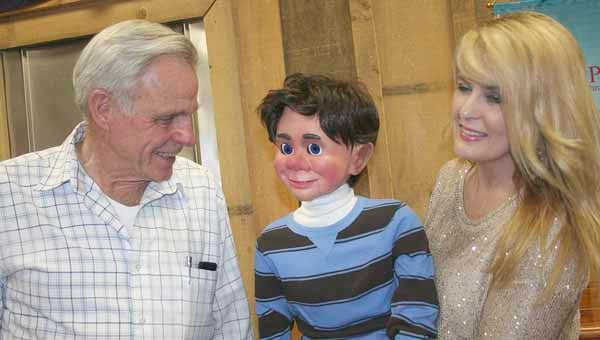 Ventriloquist Tammy Chavers was the program guest of Rotarian Homer Homann at the Brundidge Rotary Club Wednesday. Chavers uses her talent to “Share the Love of Jesus Christ” through her ventriloquist dummies. She is picture with Homann and Charlie. 