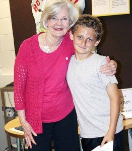 Alabama First Lady Dianne Bentley visits with Banks  student  Gage Horn Wednesday.