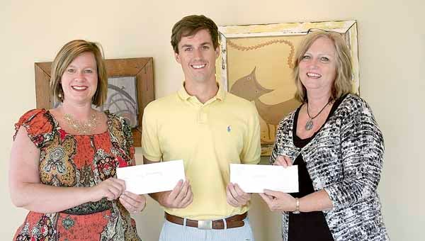 TroyFest Chairman Rob Drinkard presented monetary awards to the teachers of the winners of the TroyFest Student Art Competition “Best of Show” awards at TroyFest 2013. Jennifer Lindsey, Troy Elementary School, received the awards for grades K-2 and 3-5. Pam Smith, right, Charles Henderson High School, received the awards for grades 9-10 and 11-12. Not pictured, Jennifer Sullivant, Charles Henderson Middle School, who received the award for grades 6-8.