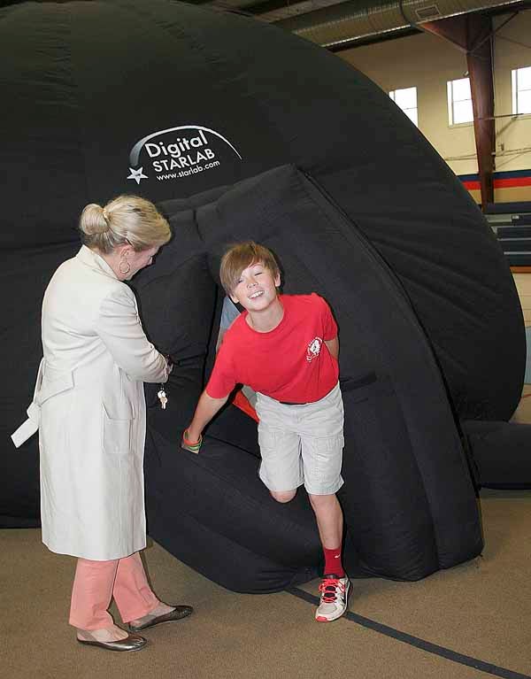 A CHMS student exits the Stardome brought to the school by the McWane Center in Birmingham. The Stardome is a portable planetarium and its trip to Troy was made possible by a Troy City Schools Education Foundation grant.