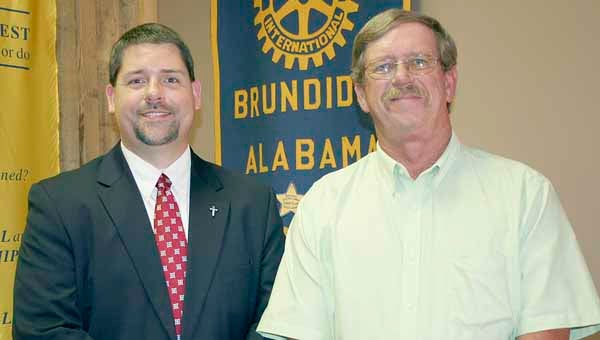 Chuck Carson, left, Troy University Athletic Department director of development of major gifts, was the program guest of Brundidge Rotarian Steve Thrash Wednesday. Carson highlighted the growth that is taking place on the university campus and the 2013 football schedule.