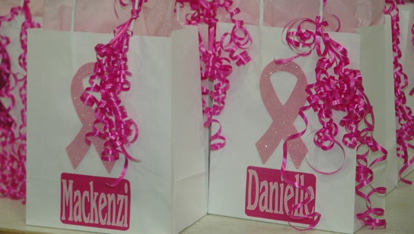 Gift bags for the players at the PLAS game were designed with the famous pink ribbon logo to further spread cancer awareness.