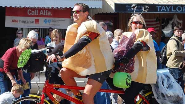 This pair on a bicycle built for two prove that nothing goes together better with peanut butter than jelly. The PB&J sandwich cyclists were part of the annual Nutter Butter Parade Saturday.