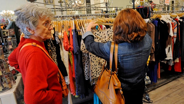 Customers shop at The Pink Parlor in Troy, Ala., Friday, Dec. 20, 2013. (Photo/Thomas Graning)