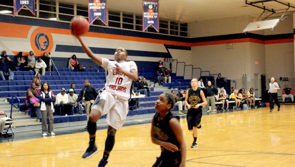 Kyra Scott goes up for a layup in the Lady Trojans' win over Ashford.