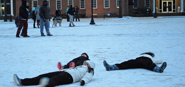 Troy University students play in the snow on campus in Troy, Ala., Tuesday, Jan. 28, 2014. (Photo/Mona Moore)