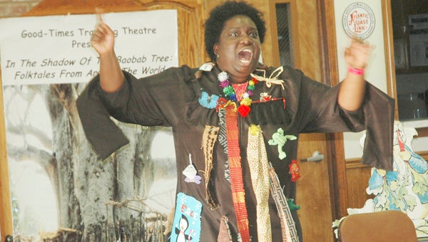 Messenger photo/Jaine Treadwell Safiya Johnson entertained youngsters and adults with her folk tales and storytelling during a performance Thursday at the Tupper Lightfoot Memorial Library in Brundidge. Johnson’s program was part of the library’s celebration of Black History Month.