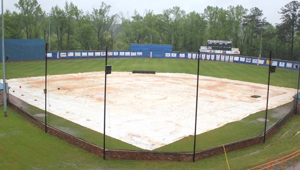 Frazier Field at Hogan’s Hole sat quiet on Friday as a large rainstorm pushed through the area. The opening round of the Alabama High School Athletic Association baseball playoffs were postponed until Saturday afternoon. (Photo/Ryan McCollough)