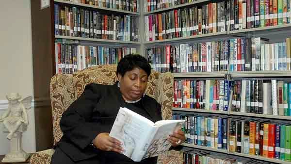 Cynthia Pearson, Brundidge City Council member, attended Open House at the Tupper Lightfoot Memorial Library  Wednesday. The rain kept her inside but she found a cozy place to sit, read and enjoy her extended stay.  MESSENGER PHOTO | JAINE TREADWELL