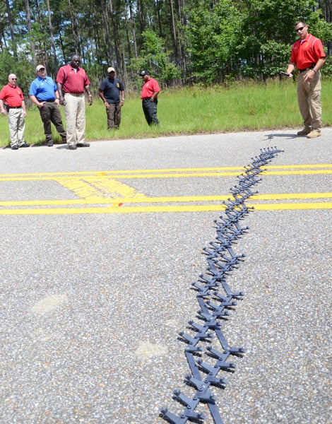 Officers with the PIke County Sheriff’s Department participated in a training course on the proper way to deploy and use road spikes. (Messenger Photo / Mona Moore)