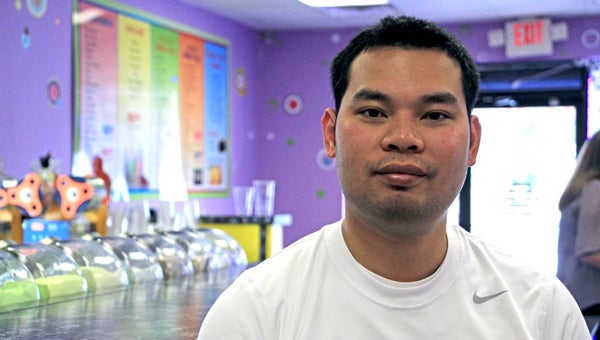 Henry Nguyen (above) is the owner of Bubble Tea, a new business on George Wallace Drive that  serves a variety of drinks and smoothies featuring bubbles, which are liquid-filled flavored candies. (Messenger Photo / April Garon)