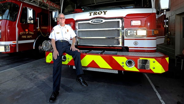 Retiring Troy Fire Department Capt. Leo Cobb poses for a portrait at Station No. 2 in Troy on Thursday. Cobb is retiring at the end of August after 40 years on the force.  (Messenger Photo / Thomas Graning)