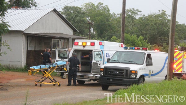 Police officers and emergency personnel work the scene of a shooting Tuesday afternoon. (Photo/Ryan McCollough)