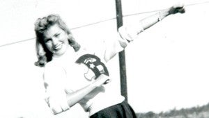 A younger Outlaw poses in her cheer uniform for Pike County. Outlaw reflected on her time spent as a Pike County High School cheerleader during the 1950s.  SUBMITTED PHOTO