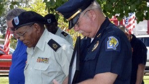 Troy Police Chief Jimmy Ennis stands in remembrance of those lost 13 years ago.  MESSENGER PHOTO/JAINE TREADWELL
