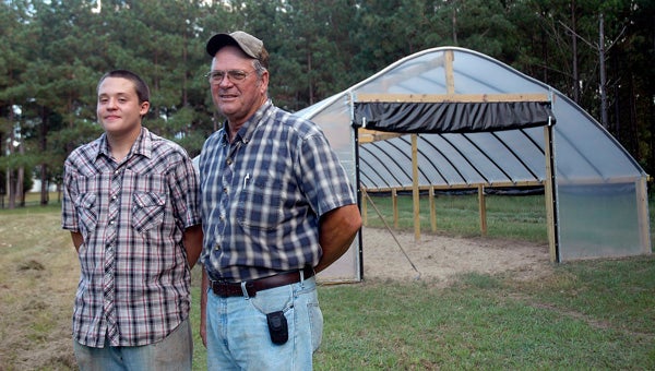 Wesley Williams and his granddad, Doug Phillips, have constructed a hoop house at their farm in the Josie community. A hoop house uses incoming solar radiation from the sun to warm the plants growing inside faster than the heat can escape the structure. A hoop house extends the fall and early spring growing seasons. Below, Wesley has done most of the preparation for the planting season at his hoop house near Josie. The preparation included preparing the soil with a hand tiller and a hand hoe. Williams will plant spinach, turnips, potatoes and lettuce this fall. He plans to plant tomatoes in early spring along with other spring vegetables.