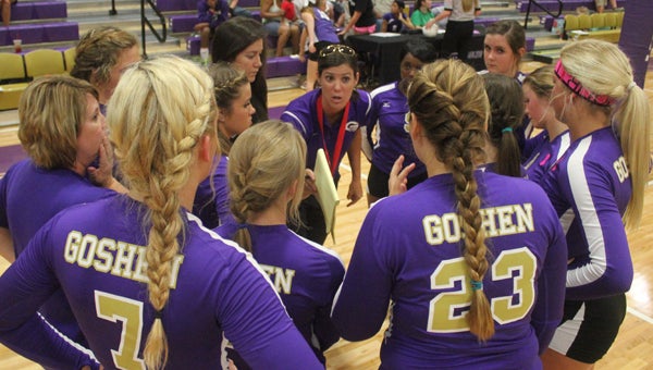 Goshen volleyball head coach Amy Warrick stresses the importance of movement and rotating defense during a timeout Tuesday. Goshen swept Brantley in straight sets. (Photo/Ryan McCollough)