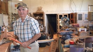 William “Billy” Powell says woodworking has been a favorite lifelong hobby. He learned from his father and now spends hours working in his shop, where he crafts everything from furniture to birdhouses. MESSENGER PHOTO/NGOC VO