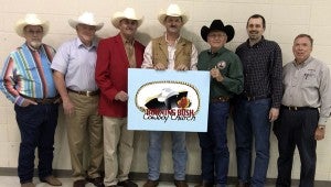 Local organizations have come together to make cowboy church a reality in Pike County. Pictured from left to right, BB Palmer, Pike County Cattlemen’s Association; Ed Whatley, Pike County Cattlemen’s executive director; Tim Brady, Pike County Cattlemen’s president; Alvie Walker, Burning Bush pastor; Phillip Gilliland, American Fellowship of Cowboy Churches; Dwayne Norman, Bush Memorial pastor; and Ken Baggett, Salem Troy Baptist Association director.  SUMBITTED PHOTO