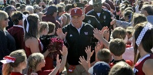 Troy head coach Larry Blakeney leads the Trojan Walk before an NCAA football game against UAB in Troy, Ala., Saturday, Oct. 1,  2011. (Messenger Staff Photo/Thomas Graning)