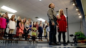 KC Bradford and Abby Ford sing the opening song for the 4th grade Main, KC Bradford and Abby Ford sing the opening song for the 4th grade Thanksgiving Program at Pike Liber Arts. Students sang several songs and read thanksgiving themed poems.  MESSENGER PHOTO/SCOTTIE BROWN