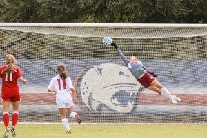 brad puckett/Sun Belt Conference Troy goalkeeper Mikki Lewis makes a diving save in the opening round of the Sun Belt Conference Tournament Wednesday.