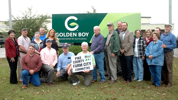 Members of the Pike County Chamber of Commerce Farm City committee toured Golden Boy Foods and KW Container on Thursday.