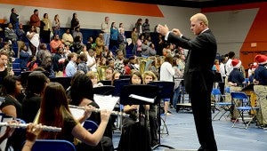 1.Director of bands, Trent Burkett, leads the Concert Band in “New Age of Christmas” to open A Christmas Gala Concert. MESSENGER PHOTO/COURTNEY PATTERSON
