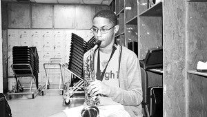 Patrick Jackson, Charles Henderson High School senior, plays his saxophone. Jackson spends his time playing his instrument and tennis. Johnson hopes to be in a band while he is in college.   MESSENGER PHOTO/NGOC VO 