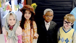 Morgan Penn, Aaliyah Agboatwala, Grayson Cameron, Jonah Brown, kindergarten students at Troy Early Childhood Center, celebrated 100 days of school on Tuesday.  MESSENGER PHOTO/NGOC VO