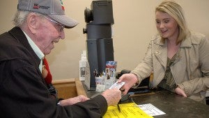 Obie Russell headed to the Pike County Courthouse on Wednesday to renew his driver’s license. The 100-year-old resident of Briar Hill said he has been driving for about 90 years, having started on a tractor when he was 10.