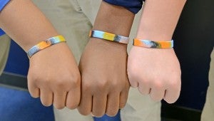 Troy City Schools are raising money by selling wristbands to support Keonte Brantley, 14, as he battles cancer. Bracelets are $2 each and are being sold at Troy Elementary School, Charles Henderson Middle School, Charles Henderson High School and Pike Liberal Arts School. Monetary donations are also accepted.Lequisha Rodgers, Kelshun Campbell and Charlie Rawls proudly show off their wristbands to support Keonte Brantley. (portrait) Adaisa Berry (left) and Keonte Brantley at CHMS’s Valentine’s Day dance.