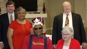 Troy Mayor Jason Reeves crowned Lorenzo Frazier and Alice Henderson, seated, the 2015 Valentine King and Queen of the Troy Nutrition Center at a ceremony on Friday. The 2014 Valentine King and Queen James Wright and Mary Daniel congratulated the new king and queen on the royal honor.