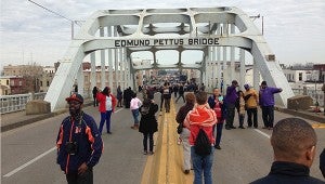 Crowds of people gather on the Edmund Pettis Bridge in Selma, Sunday before the ceremonial march.