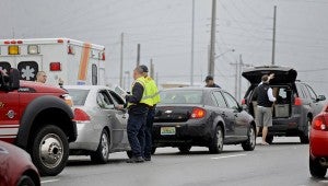 Troy police and Troy firefighters investigate a three-vehicle wreck in the southbound lane of U.S. Highway 231 in front of Sunny South Friday afternoon. No injuries were reported.