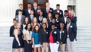 Submitted photo Hayes Lee, Carter Senn and Elaina Strother represented Pike Liberal Arts while the Pike County Schools’ Banking and Finance Academy was represented by Xavier Allen, John Bonner, Andrew Chance, Shanetta Chochran, Deshon Cowling, Marley Duncan, Anfernee Feagin, Chelsey Holland, Kamari Jackson, Jerrell Lawson, Laken Maulden, Kierra Patterson, Jasmine Paxton, Diamond Pickett, Chandia Taylor, Davia Terry Gregory Toney, Trichina Vaughn, Taylor Ward, Trey Wilson and Sharon Denison FNB President and CEO, John Ramage and FNB’s Cashier, Brian Davis represented The First National Bank at this event.
