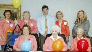Messenger Photo/Jaine Treadwell Pictured, seated, Anne Register, Mary Woodhurst and Pam Patton. Back, Nelda Price, Donna McLaney, Troy Mayor Jason Reeves, Faye Lunsford, TRMC director of support services, and Teresa Grimes, TRMC CEO/Administrator.