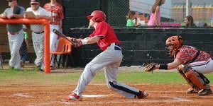 Tyler Hussey prepares to lay down a bunt for the Pike Liberal Arts Patriots  during one of their games earlier this season. Pike will face the Morgan Academy Senators in the first round of playoffs today at 1:30 p.m. FILE PHOTO