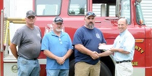 Messenger Photo/Scottie Brown Pike County Fire and Rescue, the volunteer fire department for Pike County, received a $10,000 grant from Plum Creek Timber.