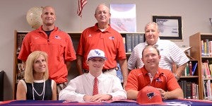 Rush Hixon signed a scholarship to play baseball with Lurleen B. Wallace Community College in Andalusia. Hixon was joined by his high school coaches as well as his parents, Laura and Billy.  MESSENGER PHOTO/SCOTTIE BROWN