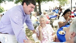 Jason Reeves visits with the citizens of Troy at the Brown Bag event on the Square. MESSENGER PHOTO/JAINE TREADWELL