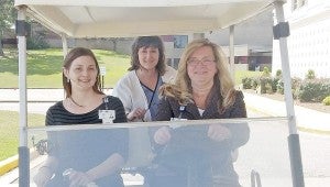 submitted photo Troy Regional Medical Center celebrated National Hospital Week May 10-16 by putting the spotlight on people. Pictured, Teresa Grimes, TRMC CEO, was the “cart” driver during the Cash Cart games on Monday. Her passengers are Janet Smith, TRMC CFO, and Amy Minor, CNO.