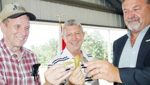 Messenger photo/Jaine Treadwell The announcement Monday of the formation of a new industry, a pickle plant, in Brundidge received a toast from business owners, Lamar Steed, left, Chip Wallace and center Pike County Commissioner Joey Jackson.