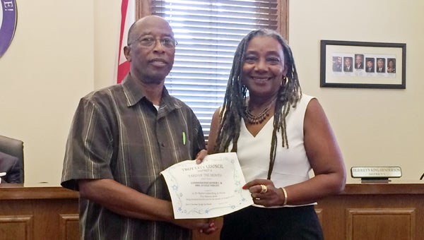 Commission Chairman Homer Wright and his wife Lucille were named the winners of District 5 Yard of the Month by District 5 Councilwoman Dejerilyn Henderson for always having an “outstanding yard.” MESSENGER PHOTO/ SCOTTIE BROWN
