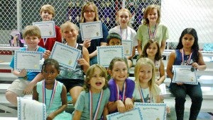 SUBMITTED PHOTO The Top Readers in the Troy Public Library’s Summer Program received certificates of recognition and were treated to a celebration party. Bottom row, from left,  Savannah Henderson, Joe Drinkwater, Lola Drinkwater, Penelope Earnest. Middle row: Kelton Coppage, Ava Leverett, Aadi Patel, Lydia Brown, Mehar Mago. Top row: Hunter Coppage, Kaley LeCroy, Dani Daniel, Maddie Norman.